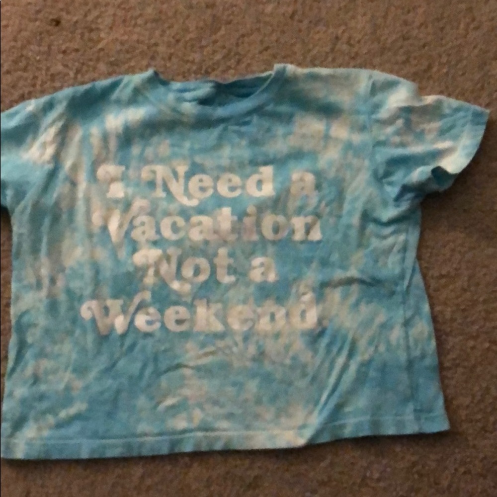 A blue tie dye cropped shirt